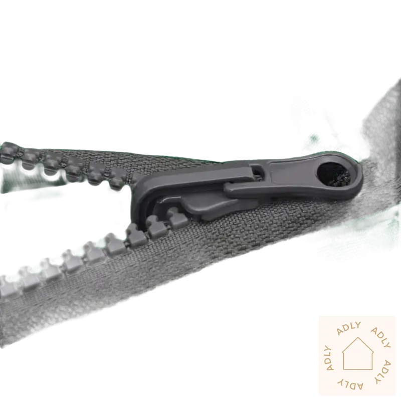 Grønn stoff med grå glidelås som passer til Pulverlakkert stål og hagemøbler