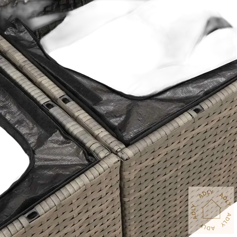 Wicker storage ottoman med svart pute i grå materialer og pulverlakkert stål