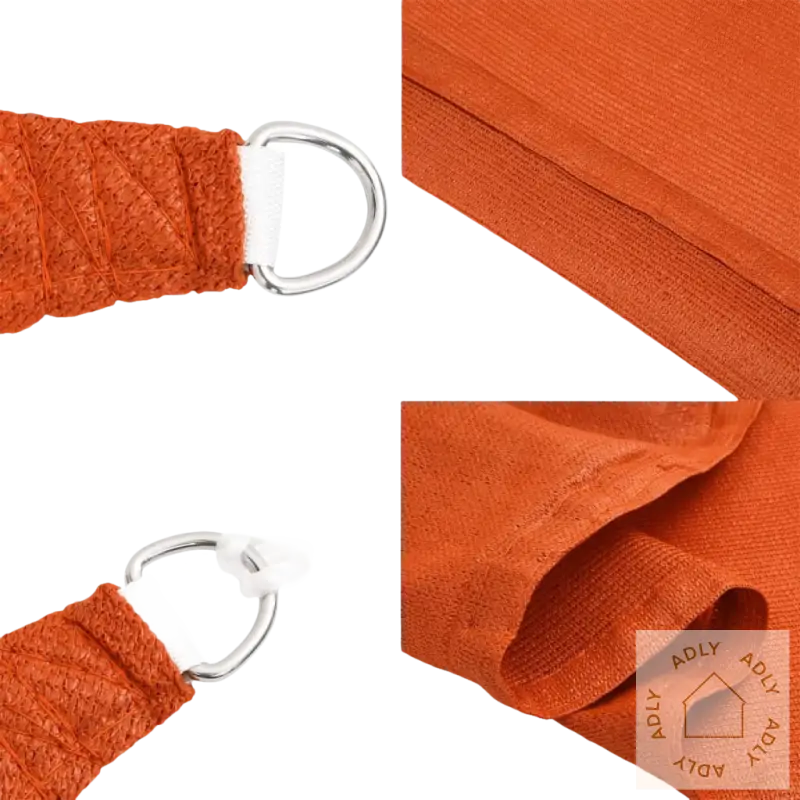 Detaljer av oransje shade sail i HDPE og rustfritt stål, perfekt sammen med hagemøbler